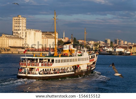 ISTANBUL - AUG 31:City passenger boat moves on to Haydarpasa Pier.  on August 31, 2013 in Istanbul, Turkey. Daily route that overcomes the tens of thousands people.
