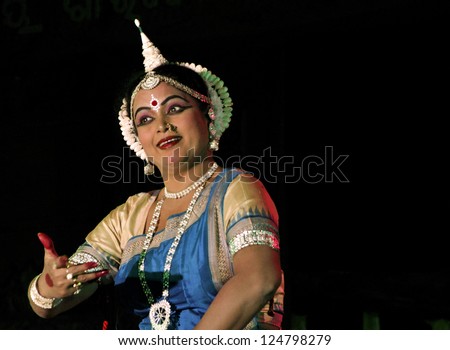 BHUBANESWAR,INDIA - JANUARY 22 : An unidentified woman performs Odissi Dance ( oldest surviving Indian dance form) in the 8th Kharavela Festival at Udaygiri, Bhubaneswar, India on January 22, 2010