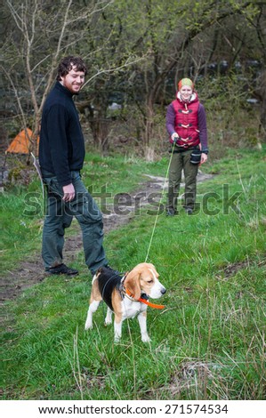 happy family with beagle dog