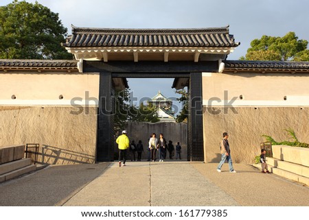OSAKA, JAPAN - OCT 26: Main entrance at Osaka castle on October 26, 2013 in Osaka, Japan. Here is one of the most famous castles that tourists all over the world want to visit.