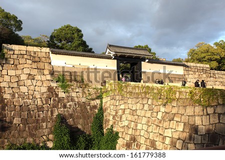 OSAKA, JAPAN - OCT 26: Main entrance at Osaka castle on October 26, 2013 in Osaka, Japan. Here is one of the most famous castles that tourists all over the world want to visit.