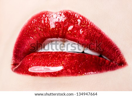 Beautiful Female With Red Shiny Lips Closeup,Macro Photography