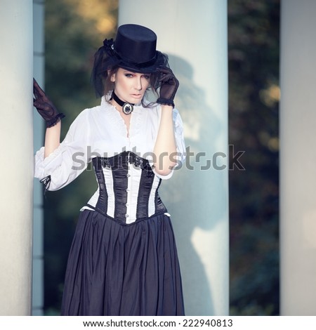 Mysterious woman in Victorian dress