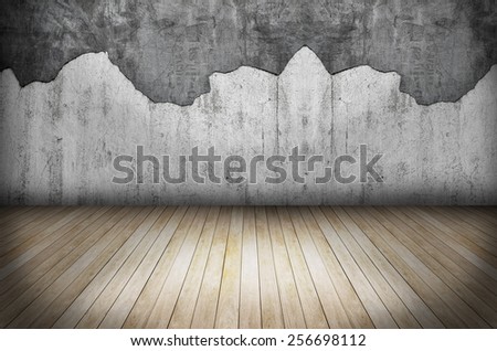 room with grunge stone wall and wooden floor