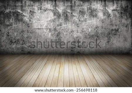 room with grunge stone wall and wooden floor