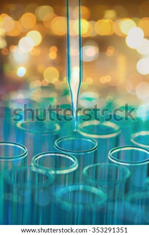 double exposure of science laboratory test tubes with bokeh