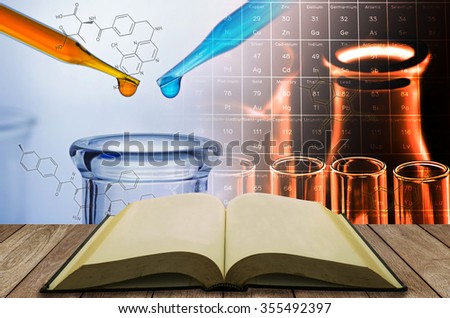 open book with science laboratory test tube background