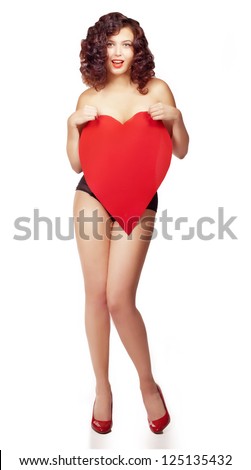 young curly brunette wearing only briefs  posing with shape of heart for Valentine day