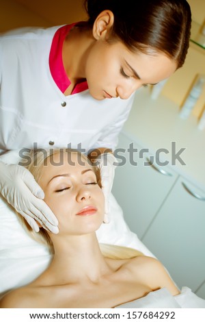 Woman in doctor\'s office beautician or beauty salon