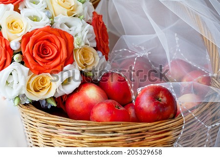 Bridal Veil, apples in a basket and bridal bouquet