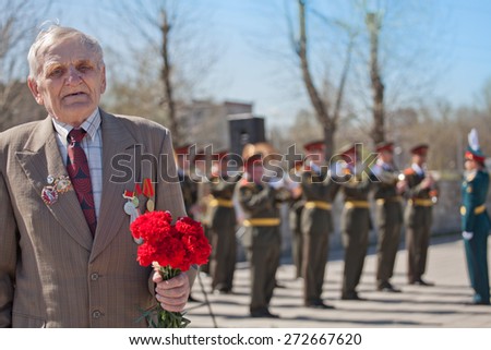 Saint Petersburg /RUSSIA - MAY 9: Old   veterans of  WWII  decorated with  medals during festivities devoted to anniversary of Victory Day on May 9, 2013 in Saint- Petersburg