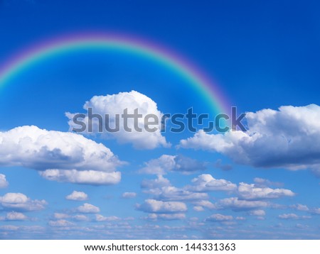 rainbow and cloudy sky