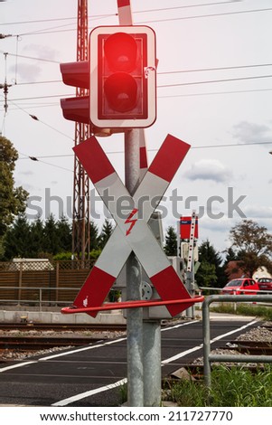 St. Andrew's cross and red traffic light