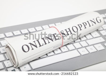 online-shopping newspaper on keyboard
