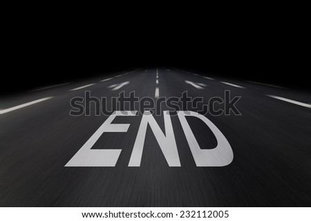 end of road written on asphalt
