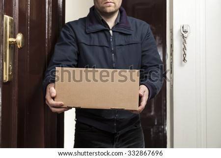 Postman delivers parcel