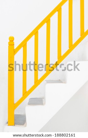 concrete stairs wooden handrail