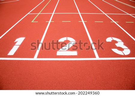 Running track numbers one two  three in stadium