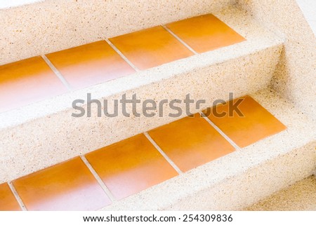 Cement with Orange tile stairs