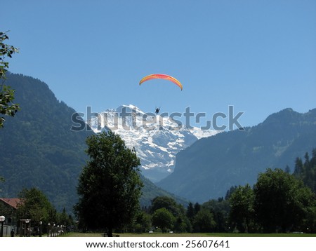 sky diving scene in swiss alps
