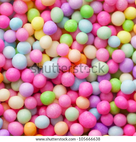 Sugar sprinkle dots, decoration for confectionery. High magnification macro.
