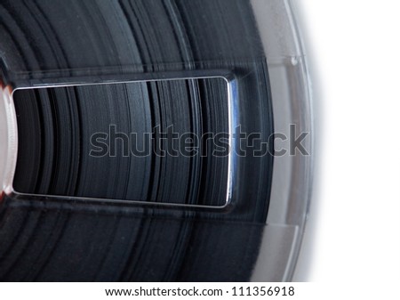High magnification of tape edges on a open tape reel.