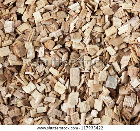 Macro of Hickory wood chips or pellets for hickory smoking.
