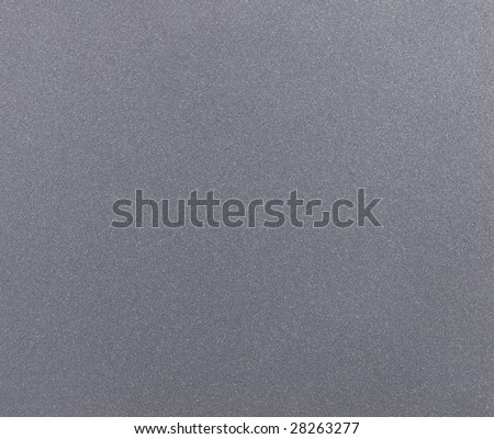 PC notebook metallic silver texture. high magnification of typical silver surface of computer equipment.