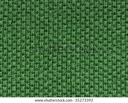 green polo shirt fabric knit texture. high magnification. perpendicular knit line.