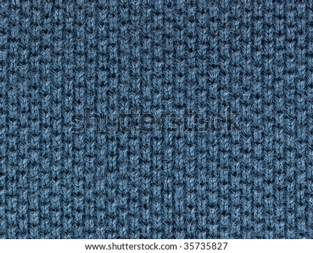 blue polo shirt fabric knit texture. high magnification. perpendicular knit line.
