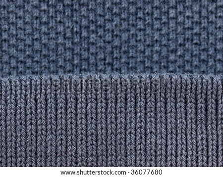 blue polo shirt fabric knit texture with sleeve section knit on top. high magnification.