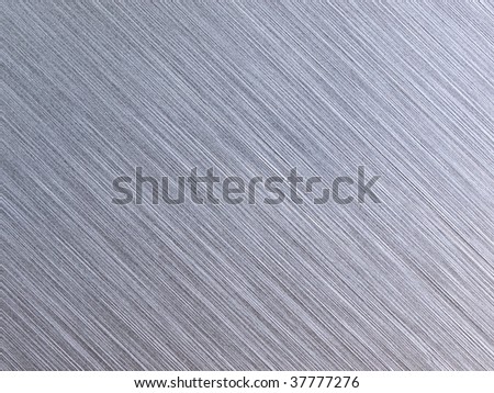 High resolution brushed metal. diagonal grain. Actual photo of brushed metal. Focus on entire surface.
