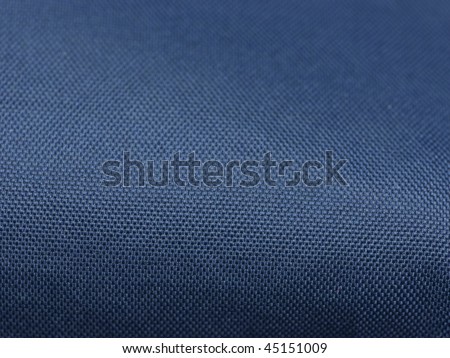 Blue outdoor gear polyester fabric close up with depth.