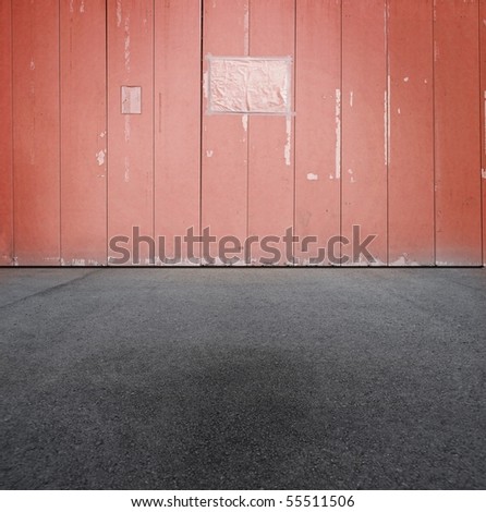red urban grungy wall with blank paper sign