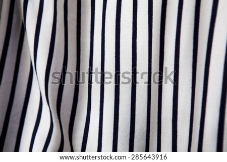 Striped fabric with wripples. white and blue border stripe pattern fabric.