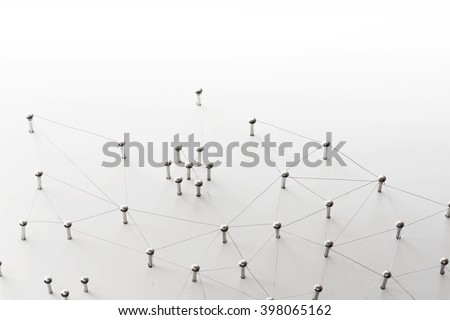 Linking entities. Network, networking, social media, connectivity, internet communication abstract. A small network connected to a larger network. Web of thin silver wires on white background.