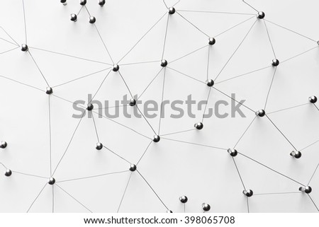 Linking entities. Network, networking, social media, connectivity, internet communication abstract. Top view. Web of thin silver wires on white background.