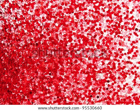 Micro red particles in liquid. high magnification macro.