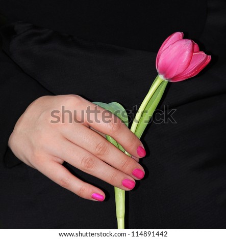 woman give condolences with a tulip