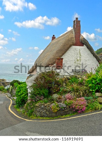 thatched cottage in a fishing village in south england