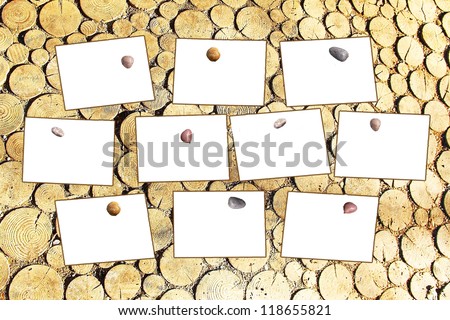 memo board with blank paper sheets, against round timber floor background