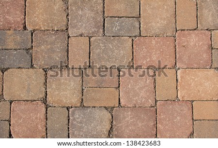 pavement made of red granite blocks