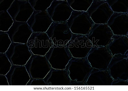 Dark background with green honeycomb pattern
