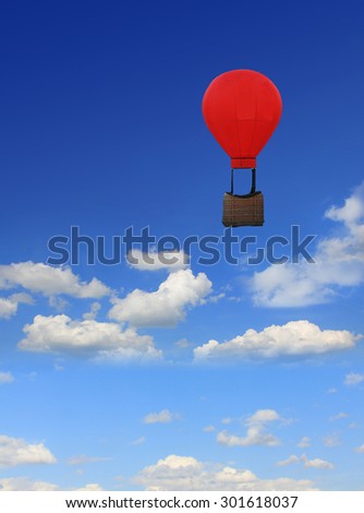 floating hot-air balloon nostalgic design, blue sky with clouds and copy space