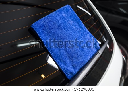 blue towel on rear windshield