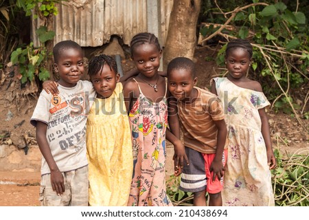 Central African Republic-July 17 unidentified boys and girls posing at streets of Bangui on July 17, 2014 in Bangui, Central African Republic