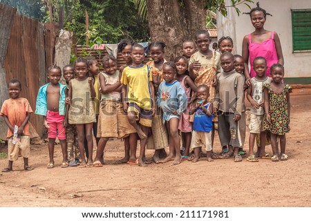 Central African Republic-July 17 unidentified children and woman posing for photography at streets of Bangui on July 17, 2014 in Bangui, Central African Republic