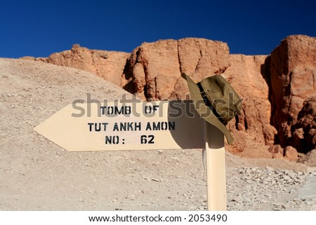 Tomb of Tut sign in Valley of The Kings with explorer Hat