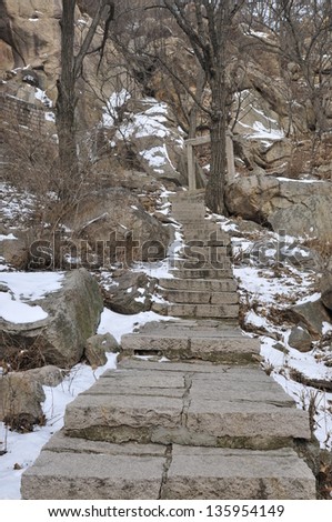 In winter the snow peaceful stone stairs
