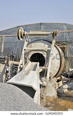 Industrial cement mixer in the construction site